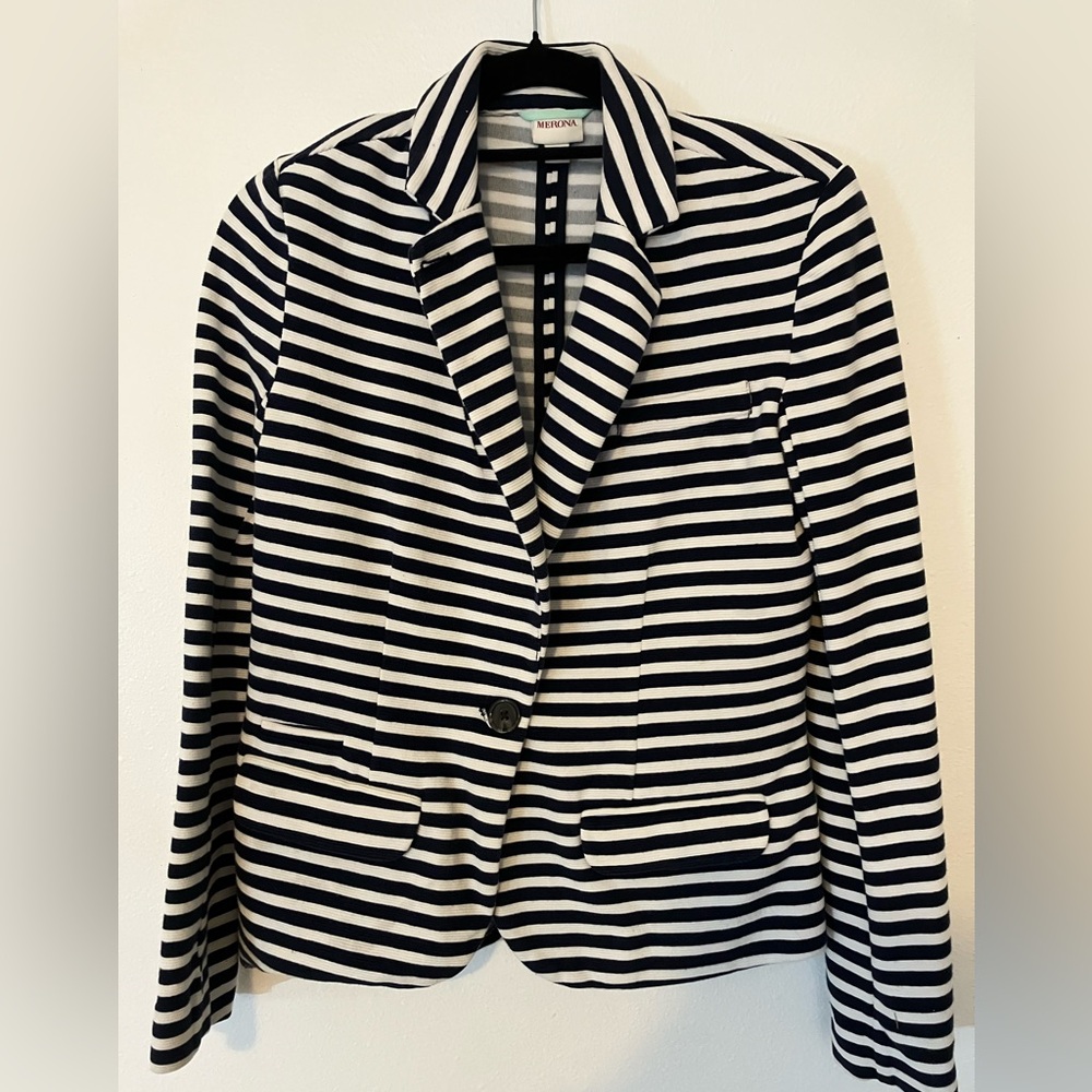 Navy blue and white cardigan .